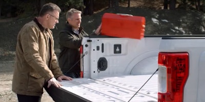 NFL great Howie Long and Chevy Chief Engineer Eric Stanczak test the strength of Ford’s new F-Series aluminum bed with a toolbox drop.