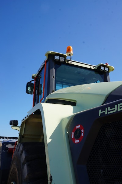 The sloping hood is a safety advantage, says John Meese with Waste Management, giving the Volvo LX1 operator the ability to see people around the back of the machine.