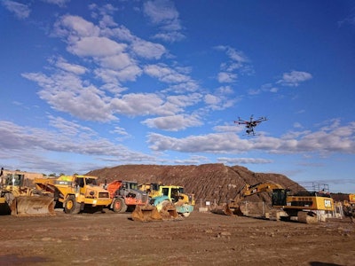 A Trimble drone on a job site is an example of a disruptive trend. Such trends are the focus of a series of a free podcasts by AEM.
