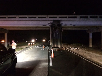 East bound traffic on Interstate 10 near Crestview, Fla. was shut down for several hours after a dump truck riding with a raised bed slammed into an overpass. The bed of the truck can be seen standing upright in the photo above. (Photos: Okaloosa County Sheriff’s Office, unless otherwise noted.)