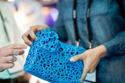The 3D printing process spins a web of material that is strong but light, rigid in the center and more flexible towards the outer rim of the tire.