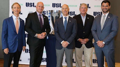 Lee Styslinger, seen on the far left, is pictured with other USL Birmingham officials.