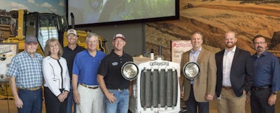 On hand when the Veerkamp collection opened this past June at the Caterpillar Visitors Center were, left to right, Jim Chapman, Veerkamp restoration specialist; Susan Morton, Caterpillar; Shawn Stover, Veerkamp restoration specialist; Doug Oberhelman, former Caterpillar CEO; Matt Veerkamp, Doug Veerkamp General Engineering and collection owner; and Karl Weiss, Adam Hamilton and Jim Jones with Caterpillar.
