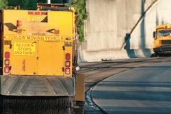 sweeper truck paving pavement road work