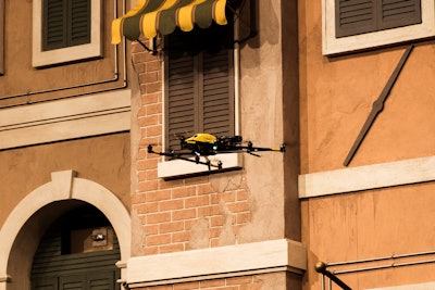 Intel’s Falcon 8+ eight-rotor industrial drone flies a demonstration inspection of a facade during an InterDrone 2017 keynote.