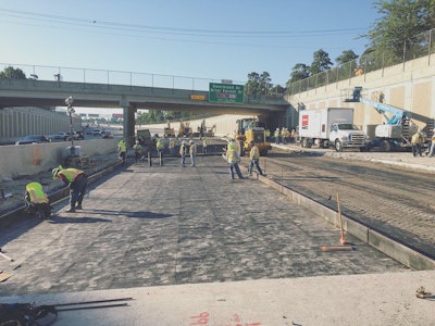 Crews repair a flood-damaged section of the southbound lanes of the West Sam Houston Tollway on September 8 in this photo by the Harris County Toll Authority,