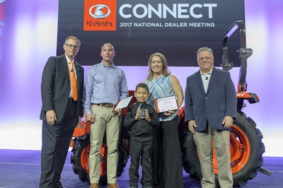 Caption: Kubota honors military veterans Matt Fitzwater (second from left), and Cherri Marin (fourth from left), with her son Ayden, with Kubota tractor donations and Geared to Give awards for their service. Pictured with Alex Woods, KTC VP of sales operations (far left) and Michael O’Gorman, FVC executive director (far right).