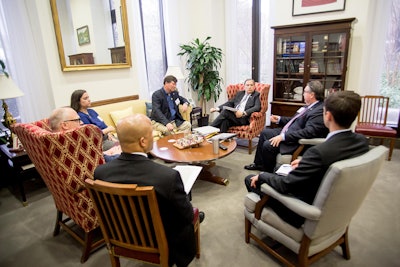 On Capitol Hill, members and staff from Equipment Dealers Association and Associated Equipment Distributors convey their concerns to lawmakers. Above, Mike Linton of Heritage Agriculture in Arkansas, (second from right) talks with Sen. John Boozman, R-Arkansas, during an April 2017 fly-in.