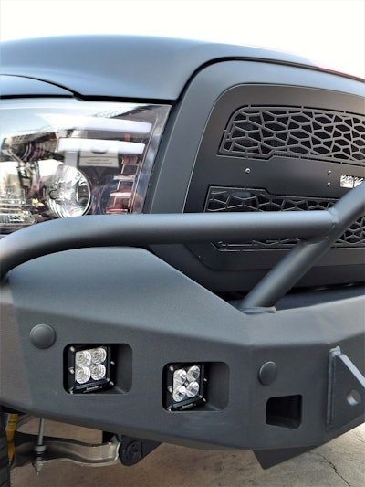 Both trucks got custom powder coated front and rear bumpers from Hammerhead with custom LED light inserts.