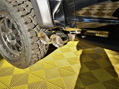 Exhaust pipes out just ahead of the middle axle. Photo: Tom Jackson