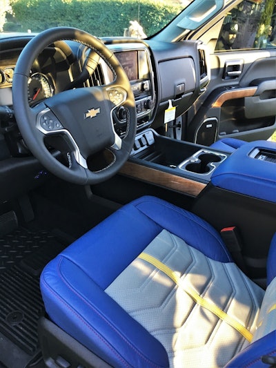 Interiors were done in custom leather styled to match the packaging colors of the Shell Rotella T6 Multi-Vehicle engine oil.