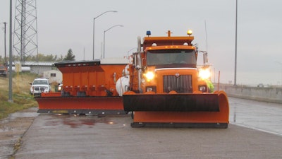The operator of the tow plow can swing out the trailer to apply de-icer or plow a wider swath of snow. Source: CDOT