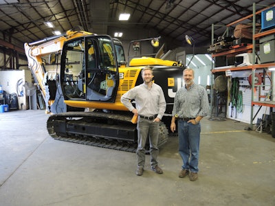 Jay Jarvis, owner of Norlift JCB, with Nathan Jarvis, sales manager,