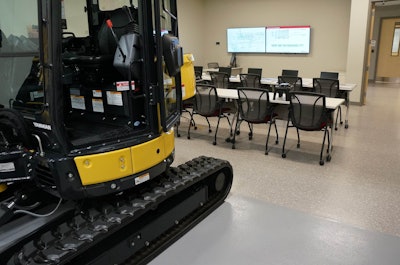 After receiving course instruction, students can turn around to the training bays in Yanmar’s new Evo Center for some hands-on learning. Photo by Don McLoud