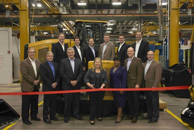 Shown at a ribbon-cutting ceremony for the Nov. 17 open are front row, left to right: Lewis Erickson, Chief Financial Officer Foley; Thomas Frake, VP Caterpillar; Robert Charter, Group President Caterpillar; Ann Konecny, CEO Foley; Cheryl Johnson, Chief Human Resources Officer; Philip Kelliher VP Caterpillar; Shane Ham, Chief Operating Officer Foley. Back row: Beau Boggess, VP-Service Foley; Doug Stuhlsatz, VP-General Counsel Foley; David Dickey, Chief Marketing Officer Foley; Jeff Fouraker, VP-Sales Foley; Matt McNett, VP-Power Solutions Foley; Jon Robinson, VP-Parts and Engine Rebuild Foley.