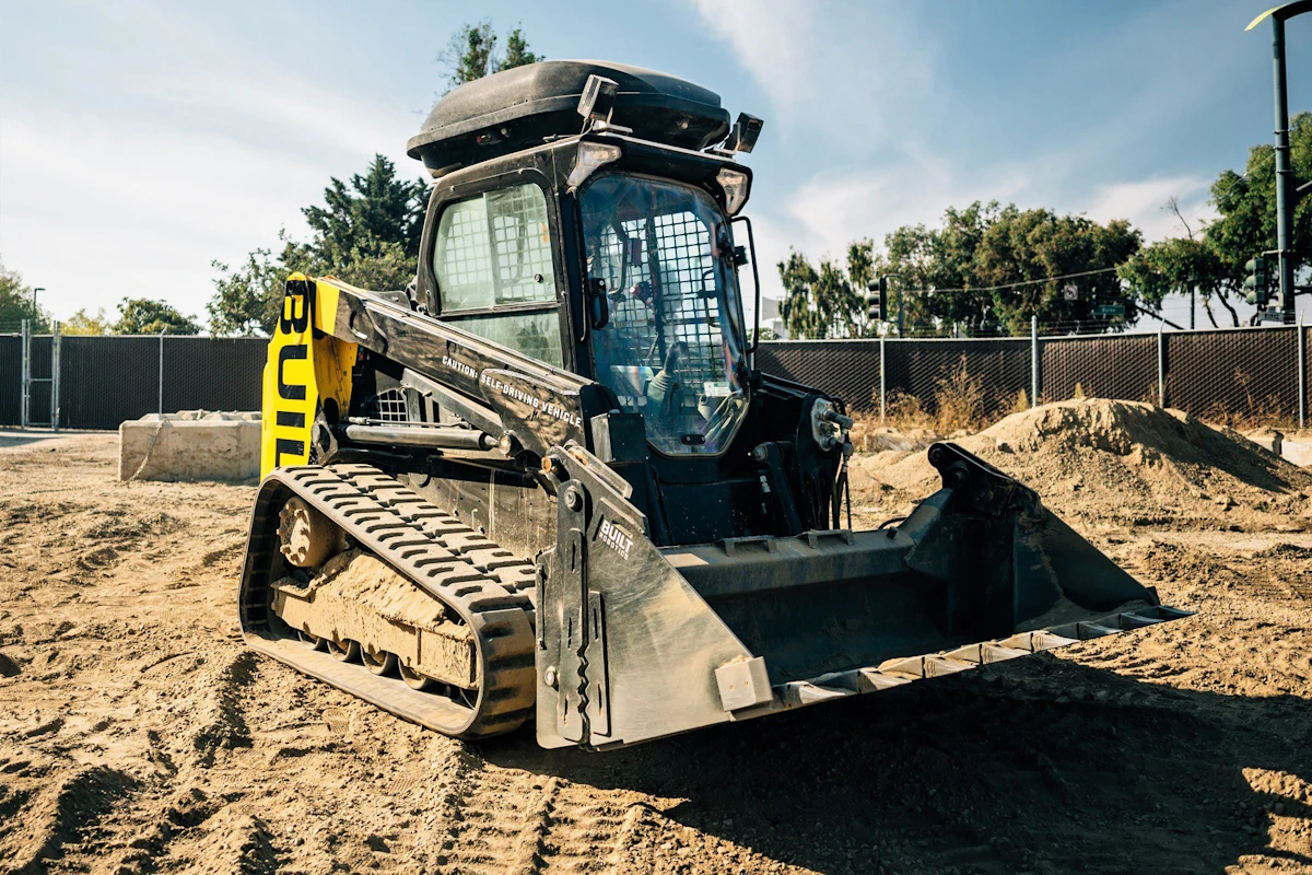 Autonomous Track Loader performs low-level excavation, grading tasks to ...