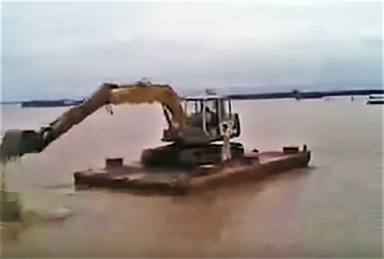 Excavator paddles away