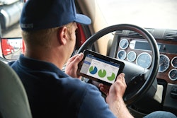 JJ Keller Driver_Adam w_tablet and log screen_D4S3106_clocks ELD