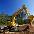 Komatsu PC238LC-11 dumping dirt