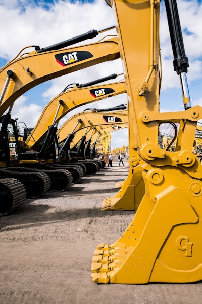 Cat excavators lined up for sale at Ritchie Bros. February Orlando 2018 auction.