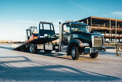 Mack Truck parked with forklift load