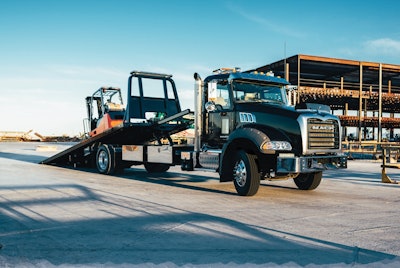 Mack Truck parked with forklift load