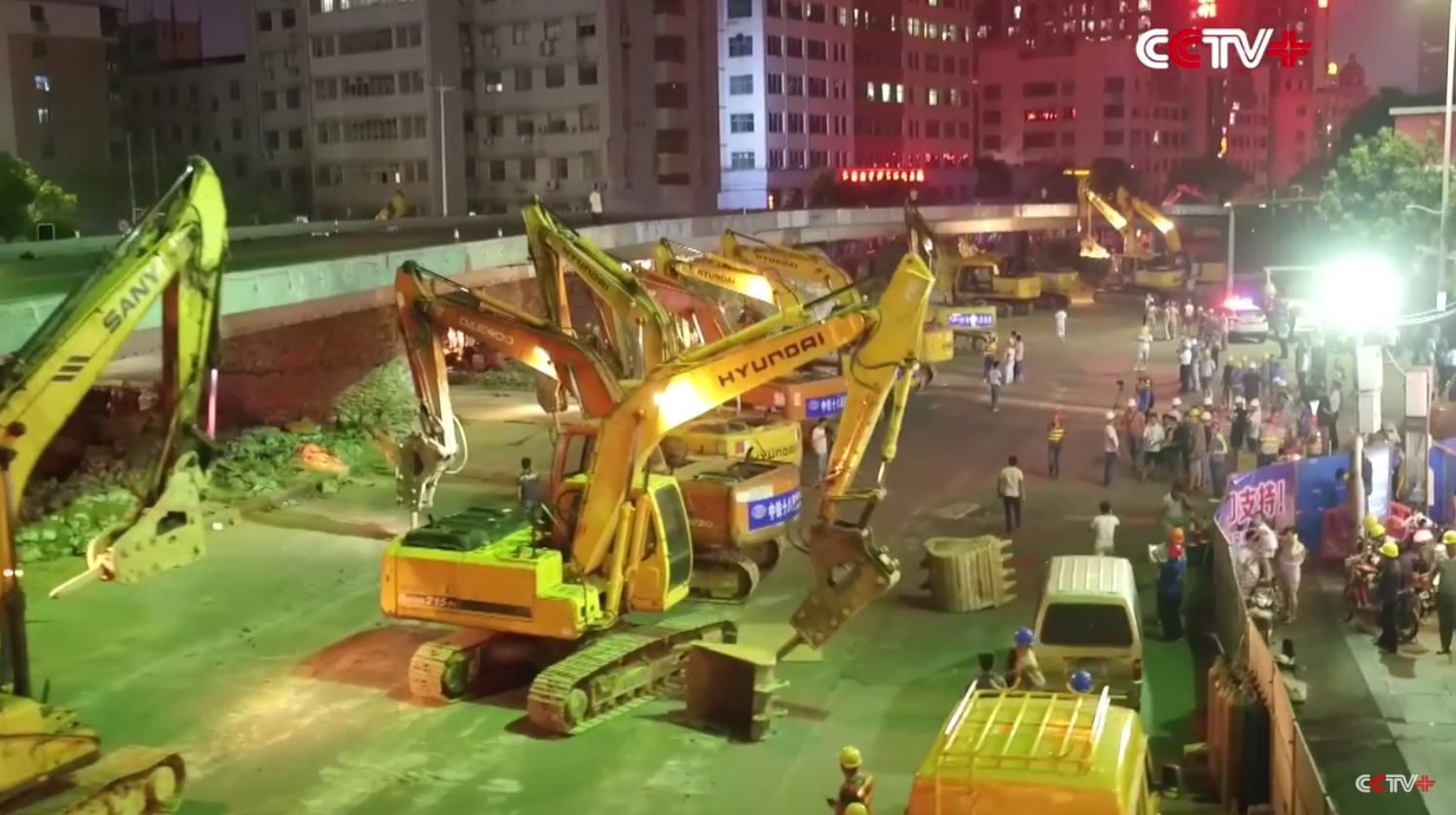 100 excavators demo bridge