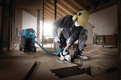Bosch’s VAC090A_9-gallon dust extractor attached to a grinder is among the company’s solutions for compliance with OSHA silica regulations.