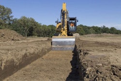 Excavator digging stock