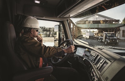 Cabs were redesigned to put most needed controls within easy reach of the driver or on the steering wheel.