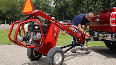 Have hitch, Little Beaver’s Towable Hydraulic Earth Drill will travel.