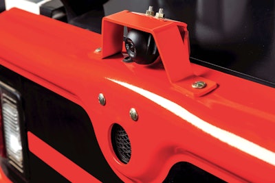 The camera mounts on your Bobcat loader tailgate protected by a sturdy metal housing.