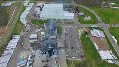 A still photo from drone footage of the fire-damaged Meridian facility.