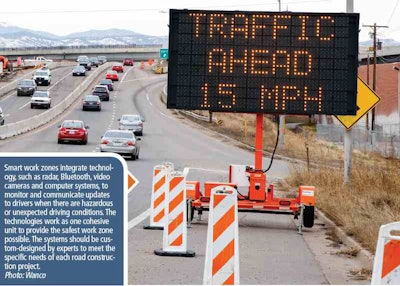 Wanco portable traffic sign on the side of a busy road