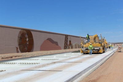 A decorative wall with scenes from Hoover Dam’s construction will be the centerpiece of the future I-11 bypass at Boulder City, Nevada.