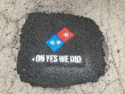 Pothole after being fixed by Domino's Pizza road construction crew