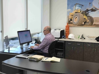 Cannon at work in his office. Photo: Courtesy of BigRentz