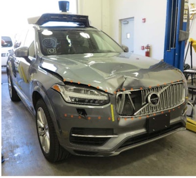 The test vehicle, showing damage to the right front, was photographed after the fatal collision with a pedestrian pushing a bicycle outside a crosswalk in Tempe, Arizona the night of March 18.