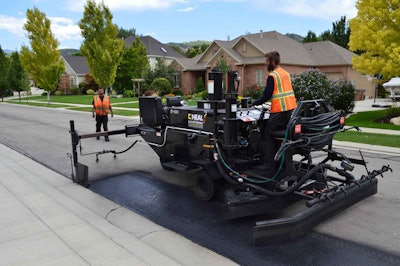 Neal Manufacturing’s DA 350 rapidly applies sealcoat for prep work along curb-and-gutter streets.