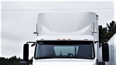 Vehicle to vehicle communication takes place via small antennas mounted atop the trucks’ hood and transponders mounted above the bumper.