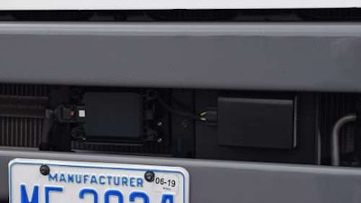 Vehicle to vehicle communication takes place via small antennas mounted atop the trucks’ hood and transponders mounted above the bumper.