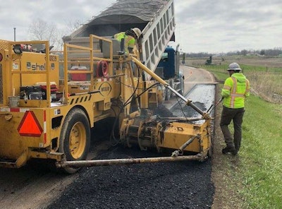 Employees-working-on-road