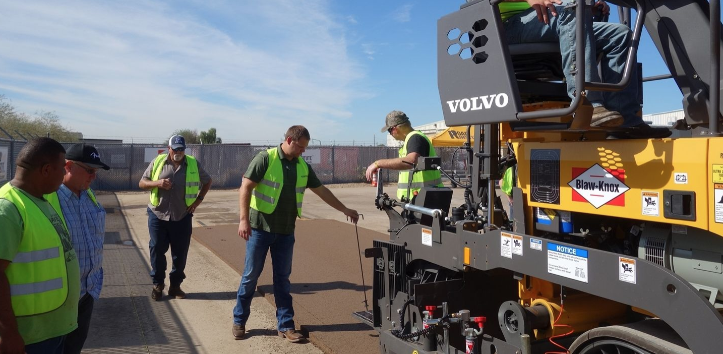 Volvo paving institute paver crew paving instruction training workers road institute