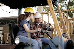 construction worker girl student apprentice training workforce stock