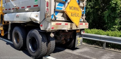 This NYDOT dump truck kept a work crew safe from a violent crash last Friday