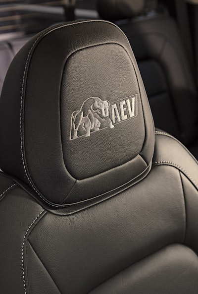 Bison features embroidered “AEV” logos on the floor liners and front head restraints.