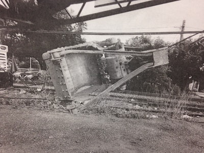 Don Antorino was using this clamshell bucket May 24, 2017, during a cesspool installation in Huntington. Bart Pember, CEO of PNZ Incorporated dba Antorino & Sons, was able to grab onto the bucket and was hoisted to safety. Source: OSHA investigation file