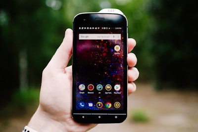 Cat S61 smartphone being held