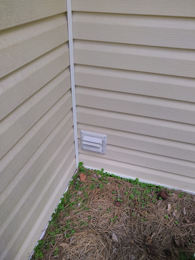 Vent outlet on the outside of a house