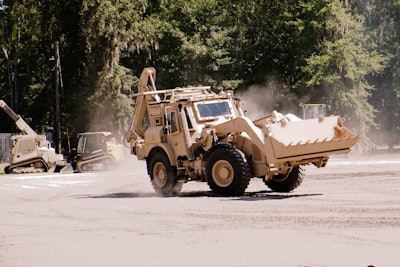 A JCB High-Mobility Engineer Excavator turns during a demonstration of its capabilities at the JCB North American Headquarters in Savannah, Georgia. Photo: Wayne Grayson.
